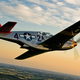 A restored P-51C Mustang painted with the distinctive red tail of the 99th Pursuit Squadron (Max Haynes)